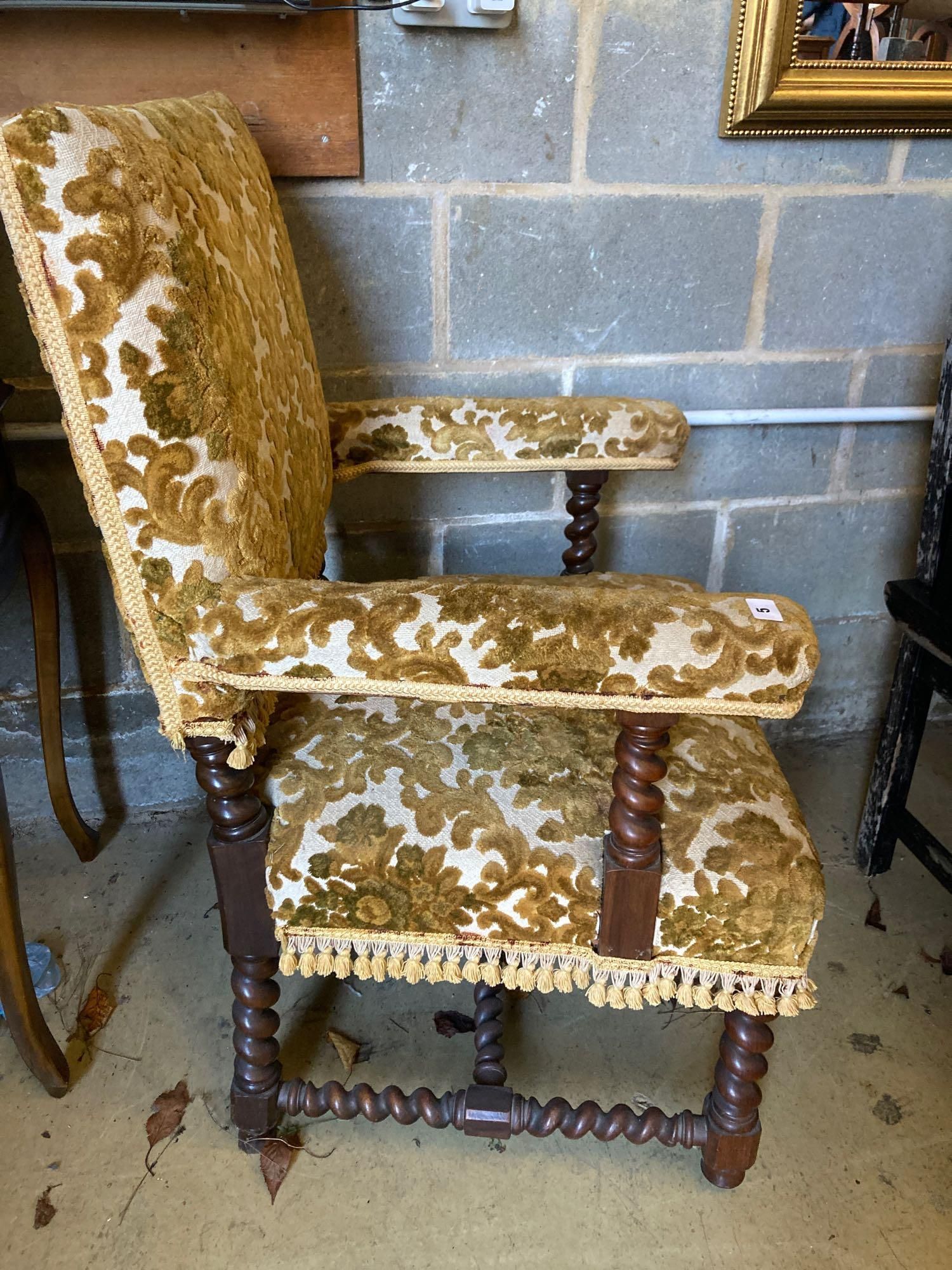 A late Victorian Carolean revival walnut elbow chair